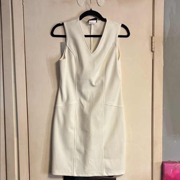 jean works and company Dresses & Skirts - Chic Cream Sleeveless Mini Dress